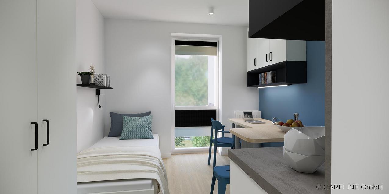 Apartmentüberblick Quartillion Wiesbaden mit Bett